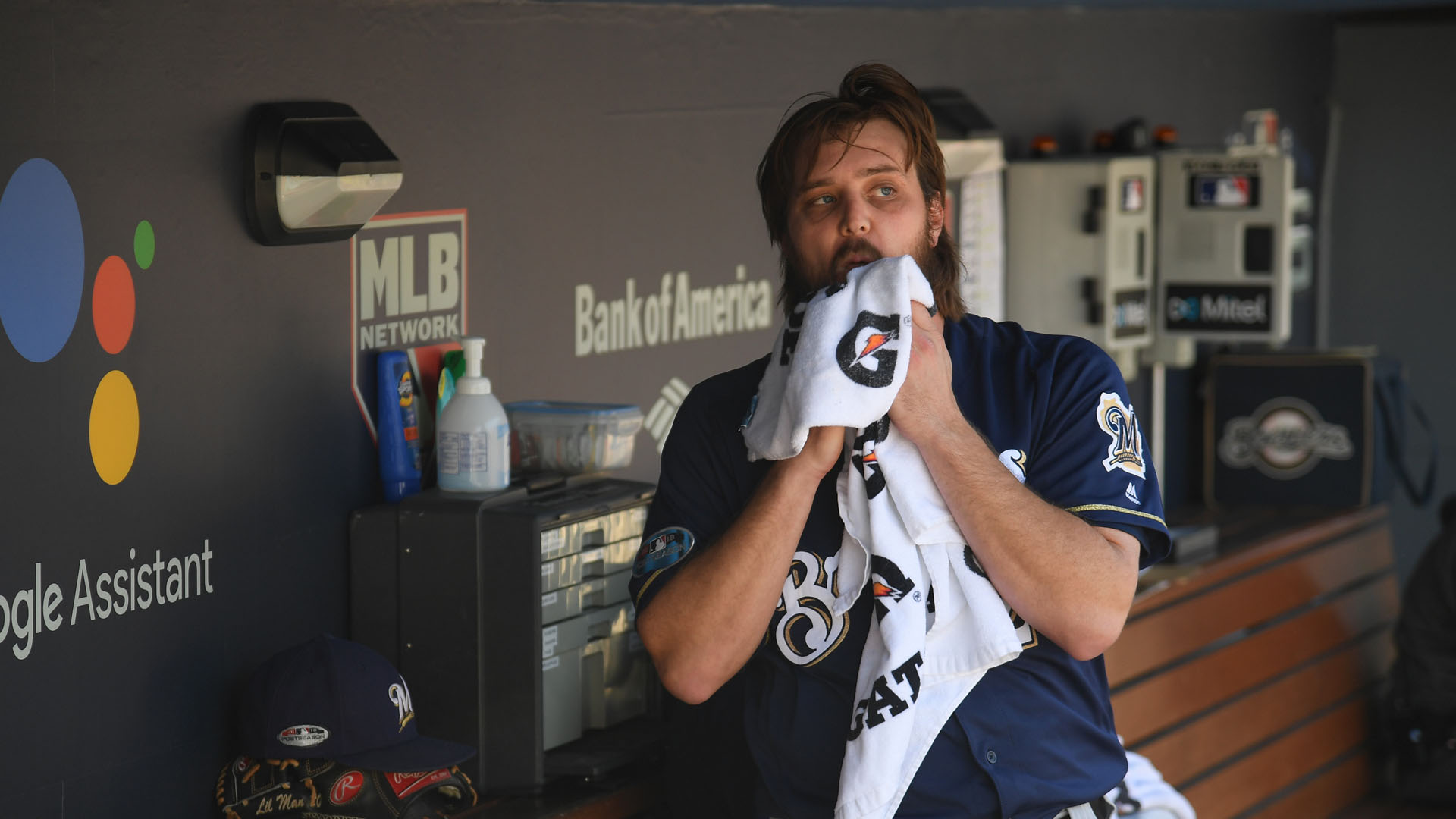Wade Miley walked Cody Bellinger to lead off the game and then manager Craig Counsell took him out.