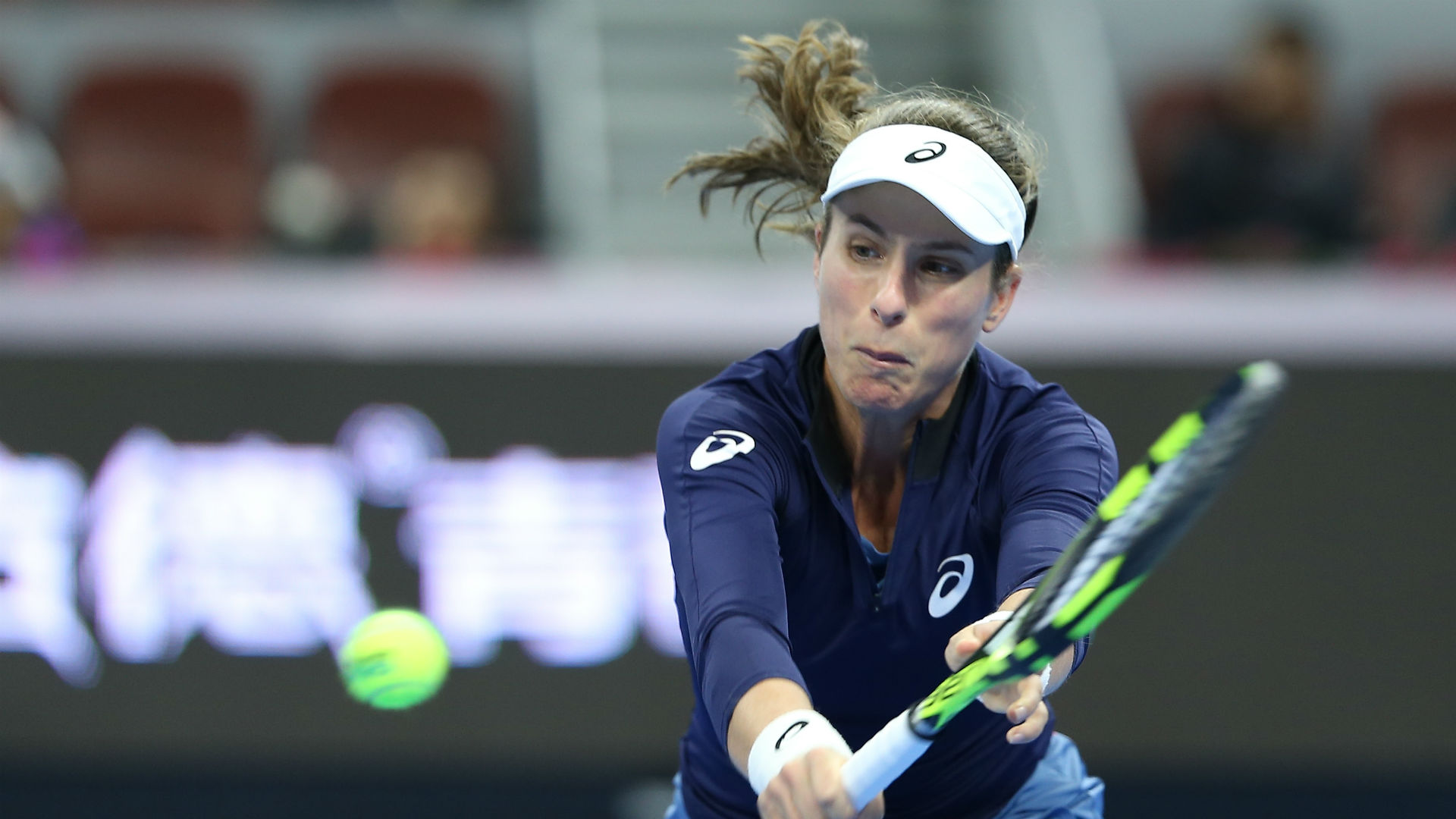 Johanna Konta has had a 2018 to forget but the British number one reached round two in Moscow at Elise Mertens' expense.