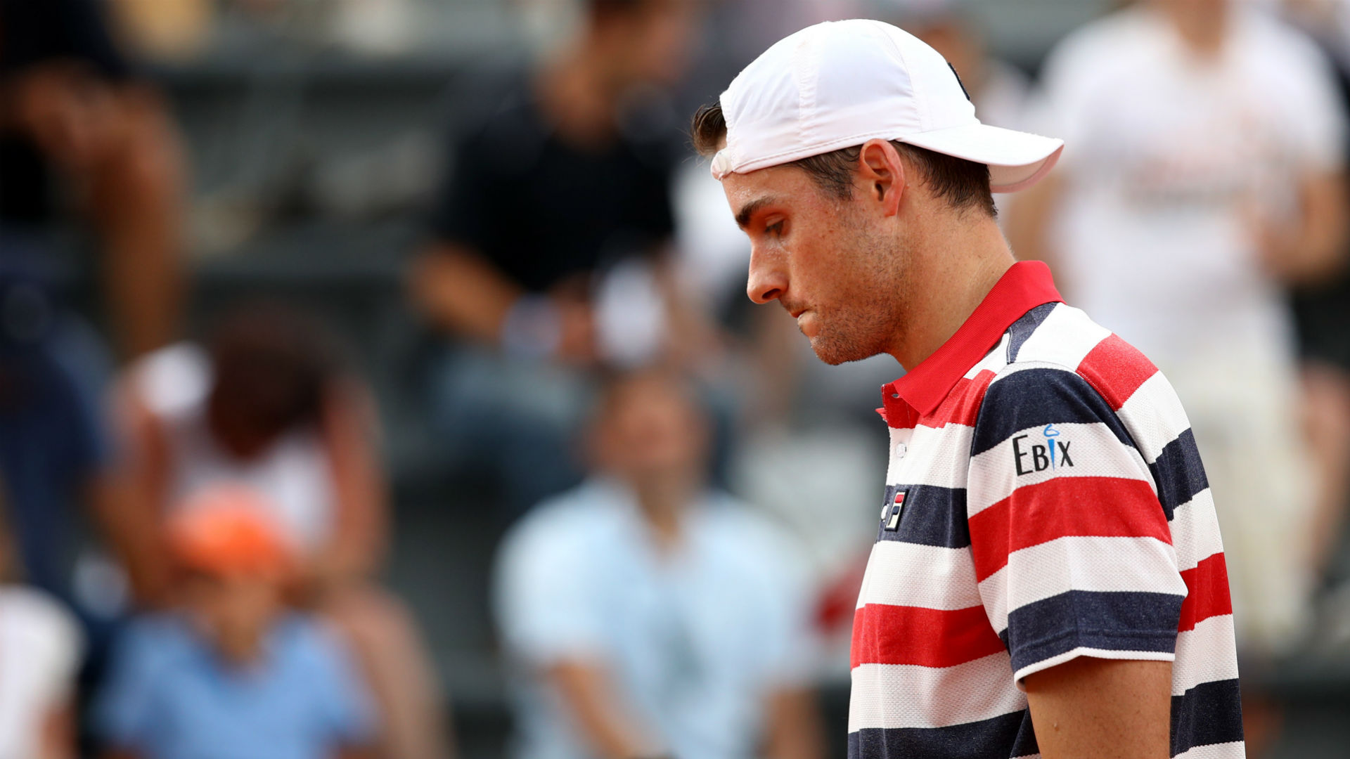A foot injury will prevent John Isner from competing at the French Open, the American has confirmed.
