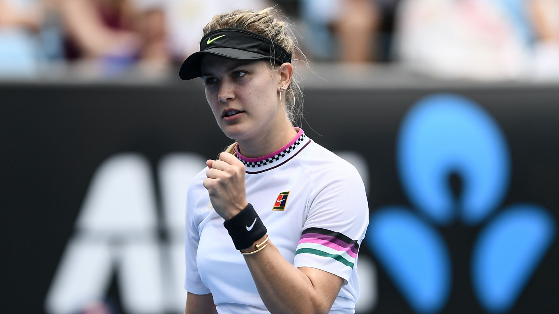 Eugenie Bouchard's reward for beating Peng Shuai is a second-round meeting with Serena Williams at the Australian Open, and she's excited.