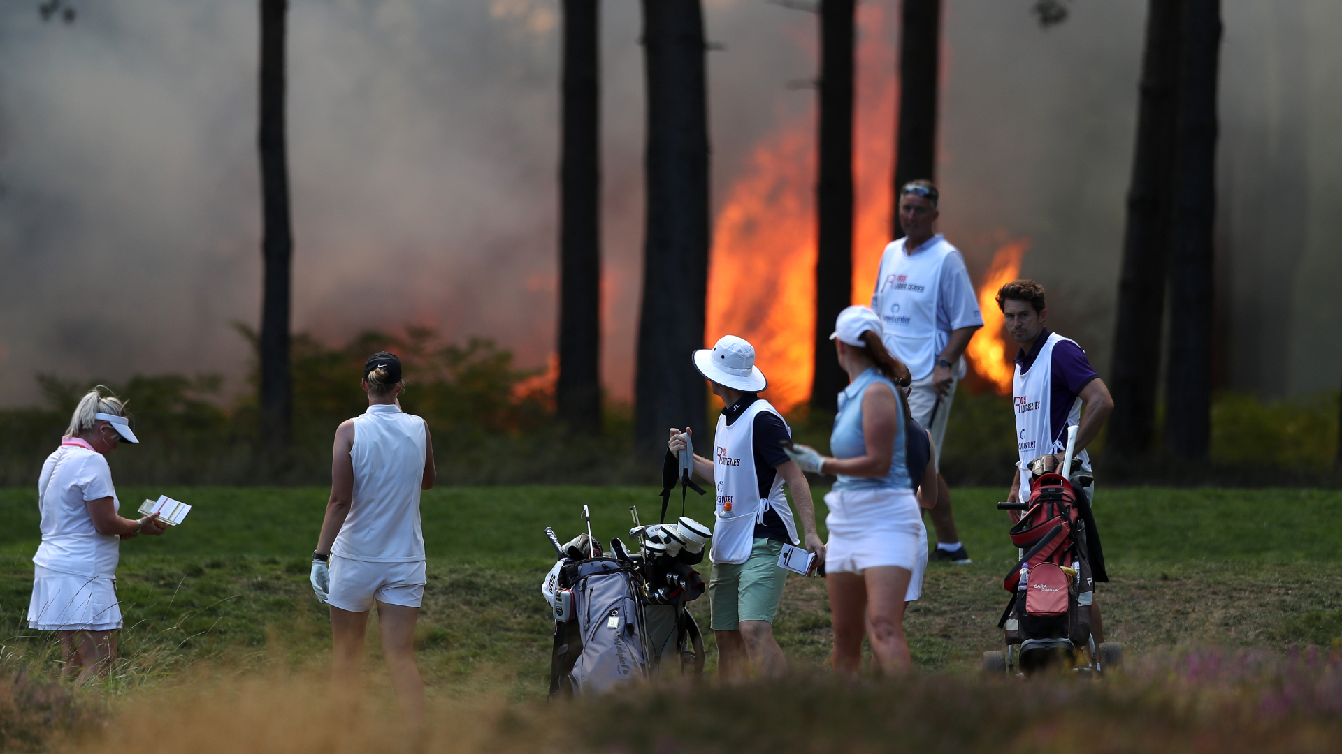 A fire that started on Chobham Common made it too dangerous for Friday's play at the Rose Ladies Series Grand Final to continue.