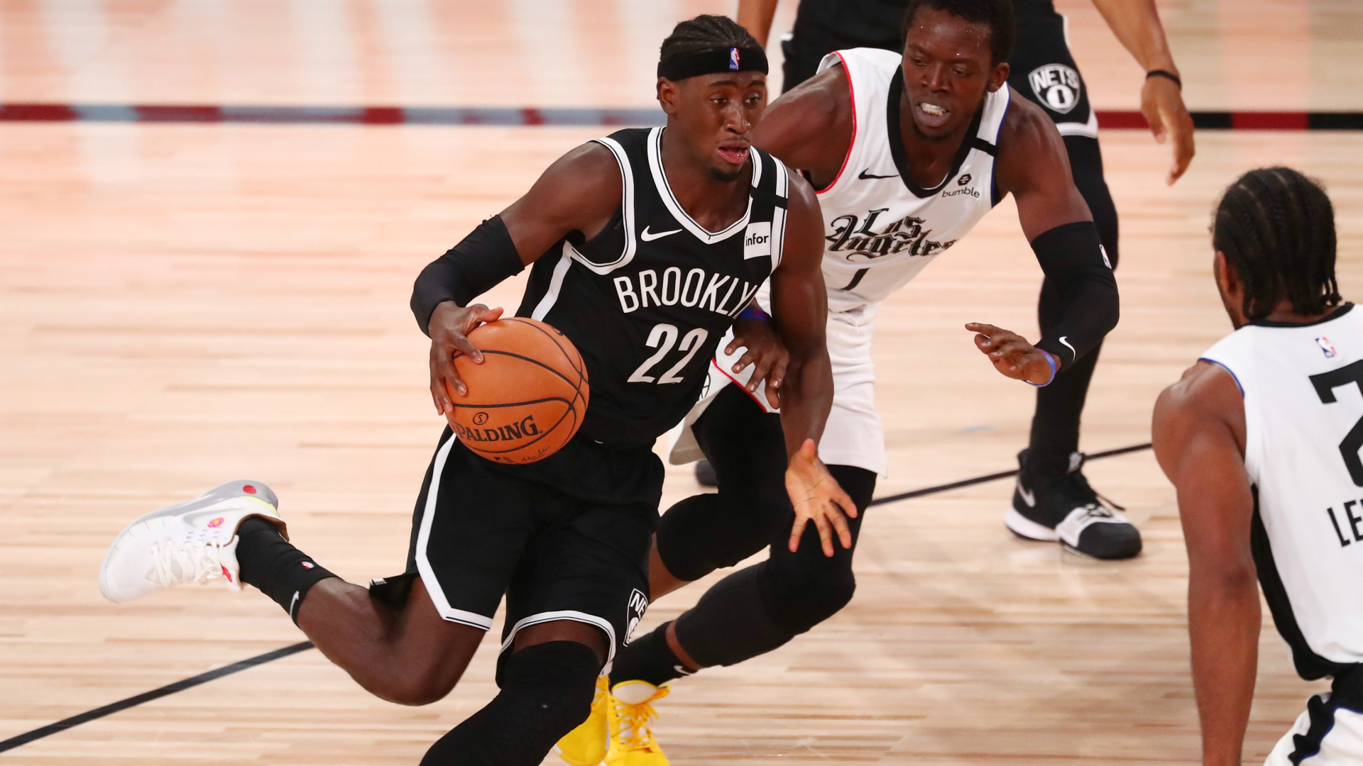 The Brooklyn Nets beat the Los Angeles Clippers to secure the east's seventh seed, while Damian Lillard inspired the Portland Trail Blazers.
