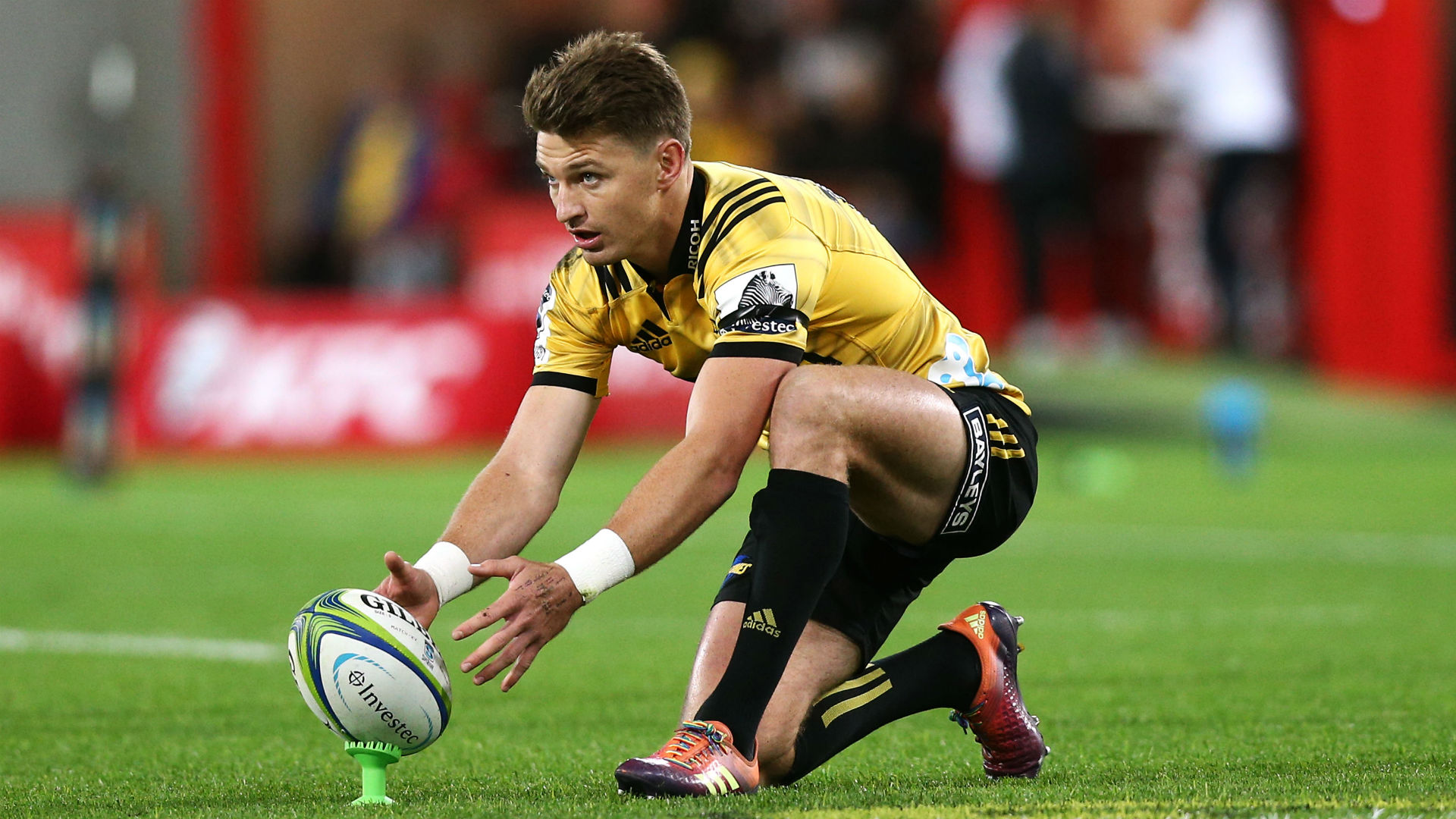 Beauden Barrett, 28, will remain in New Zealand until after the 2023 Rugby World Cup but has agreed a Super Rugby switch to the Blues.