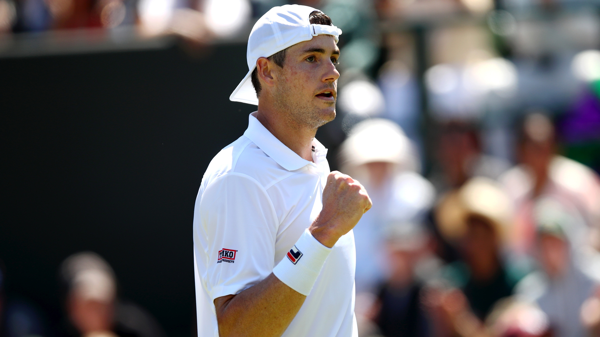 John Isner overcame Ugo Humbert in a tight semi-final at the Hall of Fame Tennis Championships.