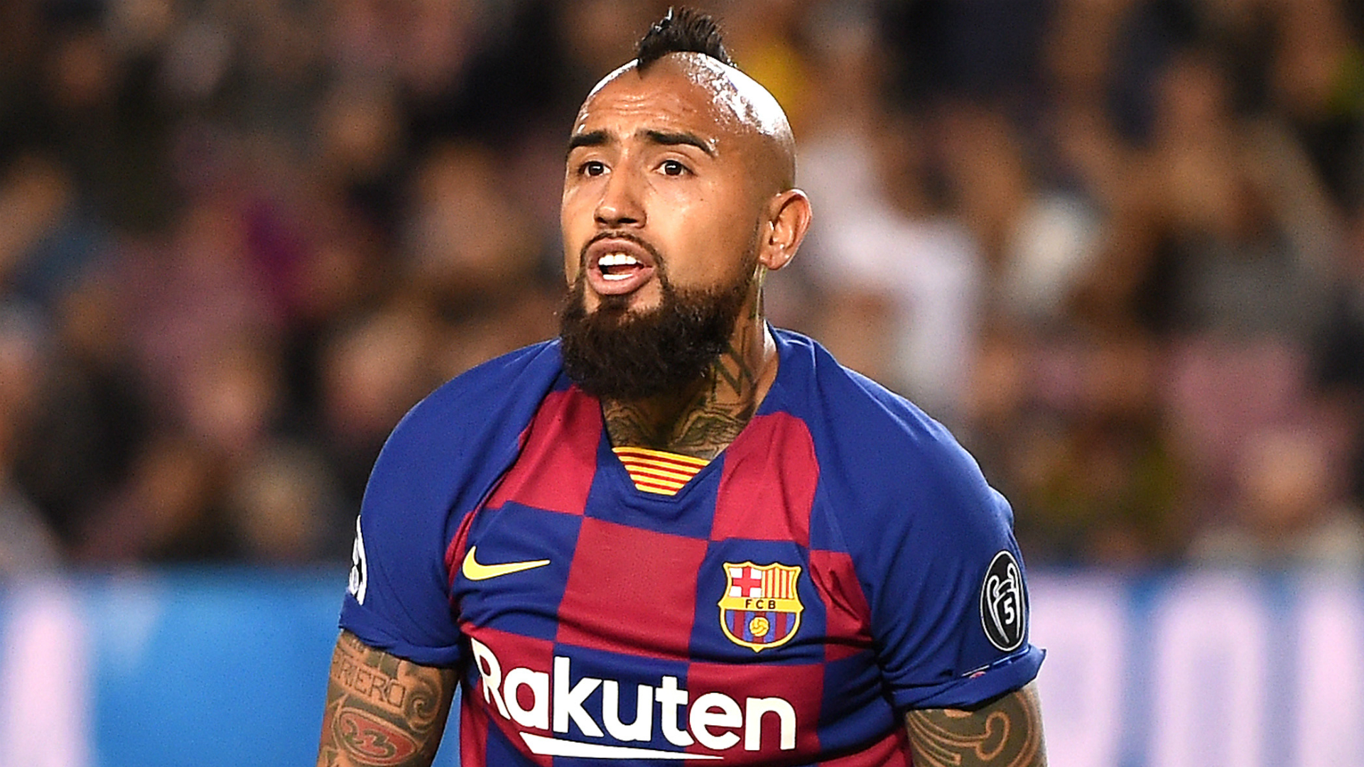 Arturo Vidal is linked with a move to Inter, but the midfielder said he was happy at Barcelona.
