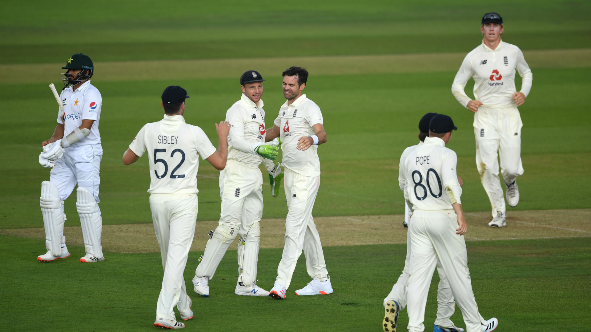 James Anderson took two wickets as England restricted Pakistan to 126-5 in a day interrupted by the weather in Southampton.