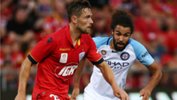 James Holland on the ball for the Reds at Coopers Stadium on Thursday night.
