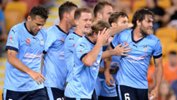 Josh Brillante celebrates scoring his first professional goal with Sydney FC teammates.