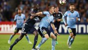 Victory defender Jason Geria looks to get the ball of Sydney midfielder Brandon O'Neill in the 2017 grand final.