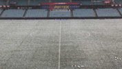 Pirtek Stadium covered in hailstones.
