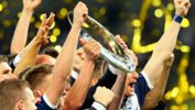 Melbourne Victory hold the Hyundai A-League Championship trophy aloft after last season's Grand Final win.