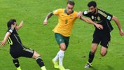 Adam Taggart in action against Spain at the 2014 FIFA World Cup.