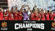 Adelaide United skipper Eugene Galekovic lifts the Hyundai A-League trophy after their 2016 grand final win.