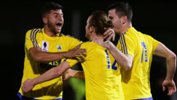 Bankstown players celebrate a goal in their win over Metrostars.