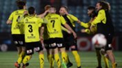 Heidelberg United players celebrate their FFA Cup win over Sydney United 58.