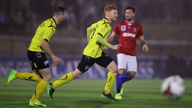 Heidelberg United's Sean Ellis celebrates after opening the scoring against Sydney United 58.