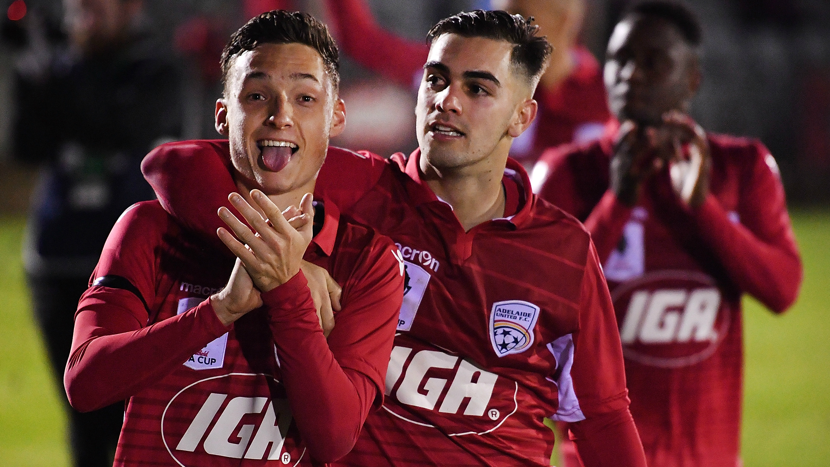 adelaide-united-players-jordan-odoherty-and-ben-garuccio-thank-the-fans-after-their-win-over-melbourne-victory_1e2a98z83vo9j1ai6szc24nqcb.jpg