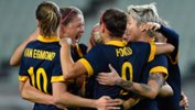 Matildas players celebrate a goal during the Olympic qualifiers in Japan.