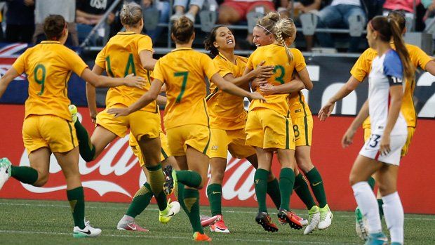 The Matildas celebrate Tameka Butt's goal in their win over the USA.