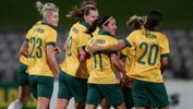 Matildas players celebrate a goal during their 11-0 win over Vietnam.