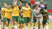 Matildas players acknowledge the crowd after their 1-1 draw with Sweden.