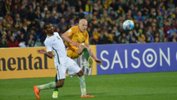 Caltex Socceroo playmaker Aaron Mooy was delighted that Australia have closed the gap at the top of their World Cup qualification group.