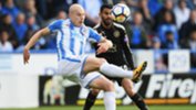 Aaron Mooy - pictured here under pressure from Riyadh Mahrez - was superb in Huddersfield's 1-1 draw with Leicester City.
