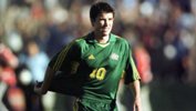 Harry Kewell trudges off the pitch after the loss to Uruguay in 2001.