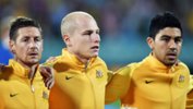 Caltex Socceroos Nathan Burns, Aaron Mooy and Massimo Luongo before kick-off against Tajikistan in Adelaide.