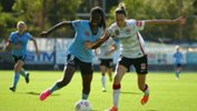 Princess Ibini and Rachael Soutar vie for the ball in Sunday's Sydney Derby at Lambert Park.