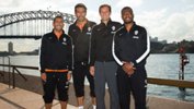 Carlos Tevez, Gianluigi Buffon, Coach Massimiliano Allegri and Patrice Evra of Juventus pose in front of the Sydney Harbour Bridge.