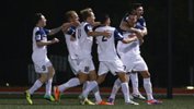 Palm Beach Sharks players celebrate scoring through Daniel Dragicevic.