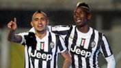 Juventus stars Arturo Vidal and Paul Pogba celebrate during last season's Serie A.