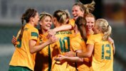 The Westfield Matildas celebrate a goal against China.