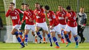 Sydney United 58 celebrate scoring the opener against FNQ Heat.