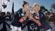 Stephanie Catley and Jessica Fishlock celebrate Melbourne Victory's Westfield W-League Championship.