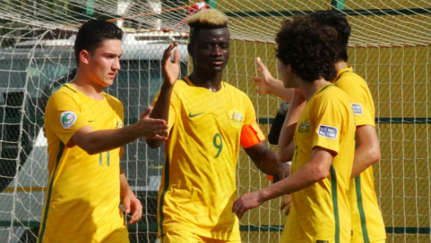 The Joeys celebrate John Roberts' goal against Uzbekistan on Sunday.