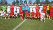 Broadmeadow Magic and Liaoning FC players pose for a team photo prior to kickoff. Image: BMagicFC Twitter