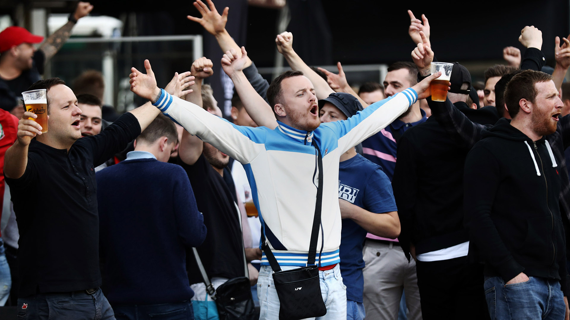 'F**k off Russia' England and Wales fans unite against hooligans