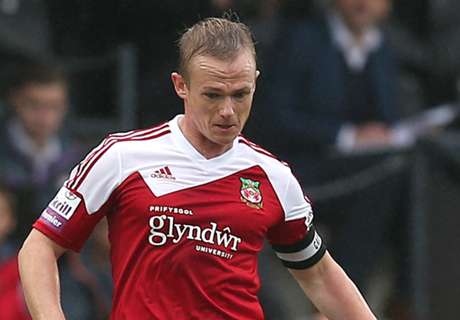 Wrexham boss punches assistant