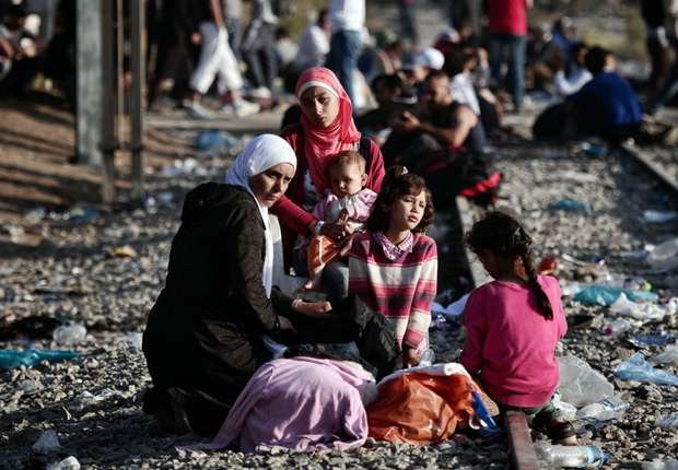 syrian-refugees-on-a-train-track_1trjfd84wy5a11li8lc0107khk.jpg
