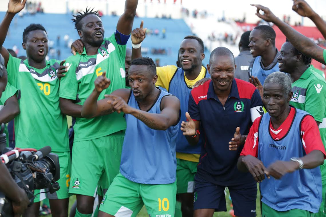 http://images.performgroup.com/di/library/Goal_Kenya/e0/a4/guinea-bissau-players-celebrate-at-the-final-whistle-as-the-win-takes-them-on-top-of-group-e_1hzmewczz05851vivv4qo05ivo.jpg?t=-1143170845
