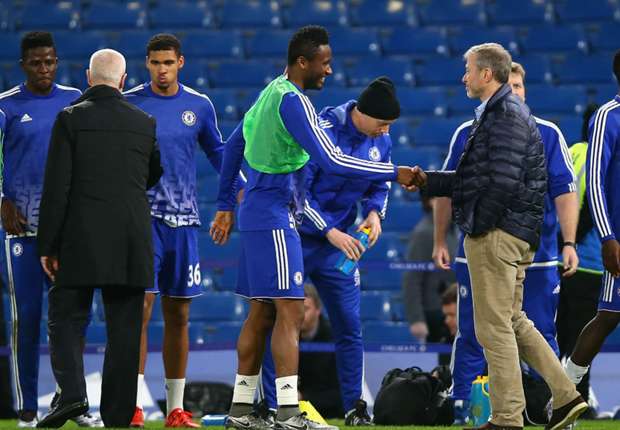 Mikel shakes hands with Chelsea owner Roman Abramovich