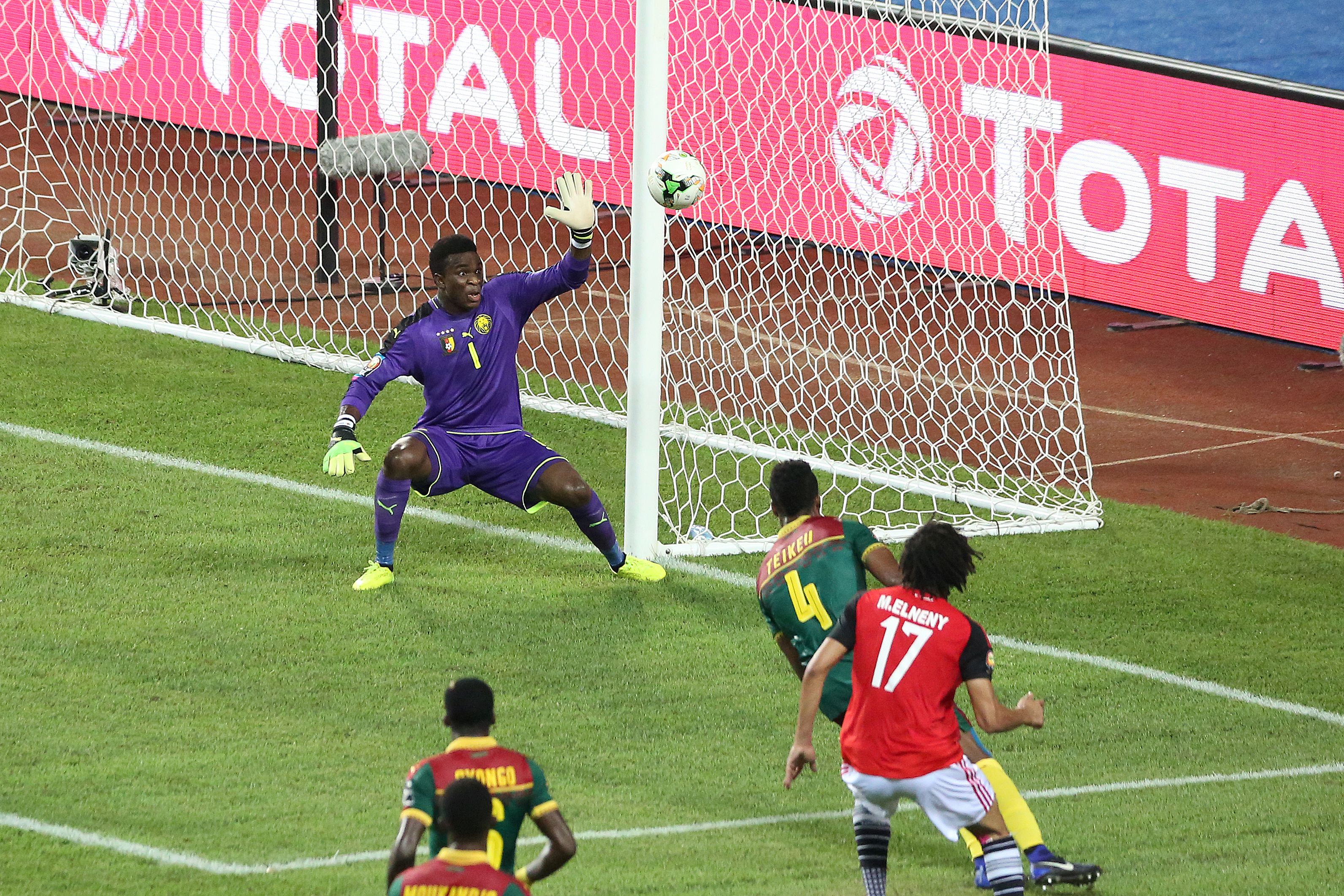 ما بعد المباراة | بين جيل يستحق لقبًا ومدرب لا يستحقه Cameroons-goalkeeper-fabrice-ondoa-misses-a-goal-by-egypts-midfielder-mohamed-elneny_opgrbbpu6yqb1g0e7jqww0bmm