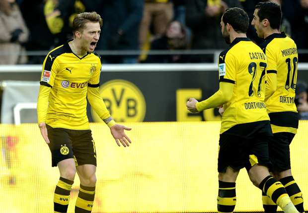Marco Reus (l.) jubelt über den Führungstreffer der Dortmunder