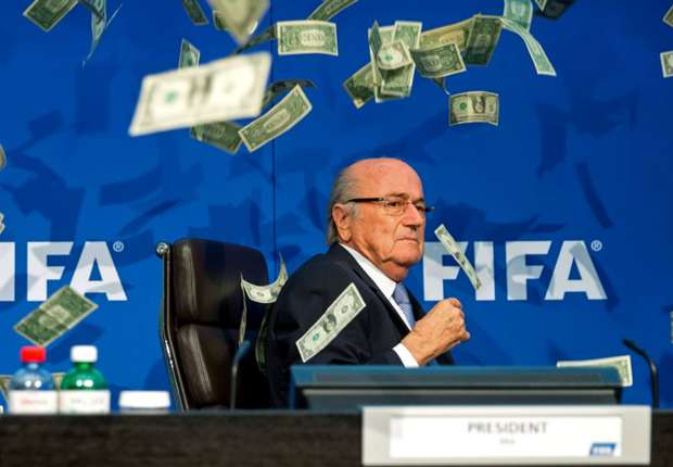 British comedian throws fake money at Blatter