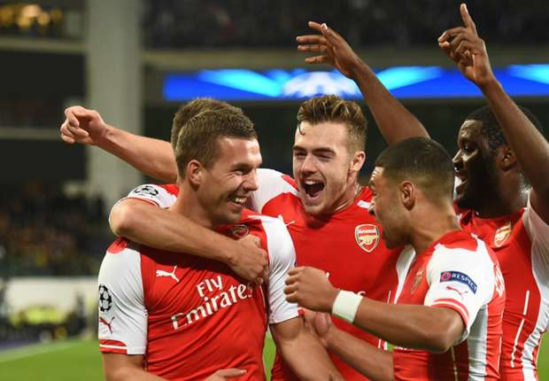 podolski celebrated with calum chambers, junior campbell and