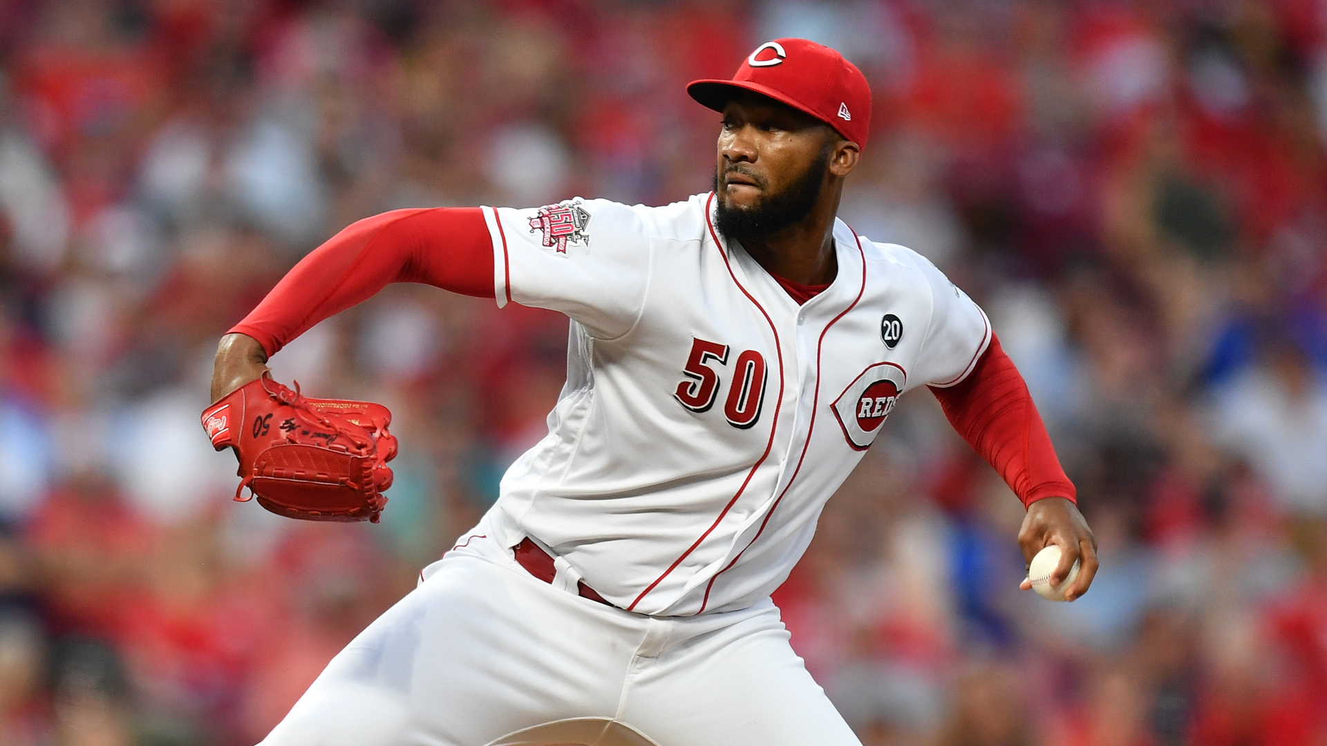 Reds' Amir Garrett rushes Pirates dugout after tensions rise in Cincinnati