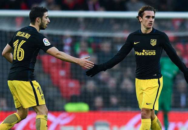 Atletico Madrid's Antoine Griezmann is congratulated on his goal