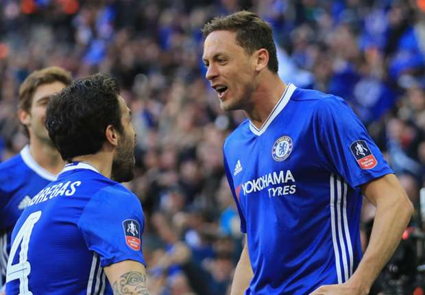 Nemanja Matic (right) celebrates with Chelsea team-mate Cesc Fabregas